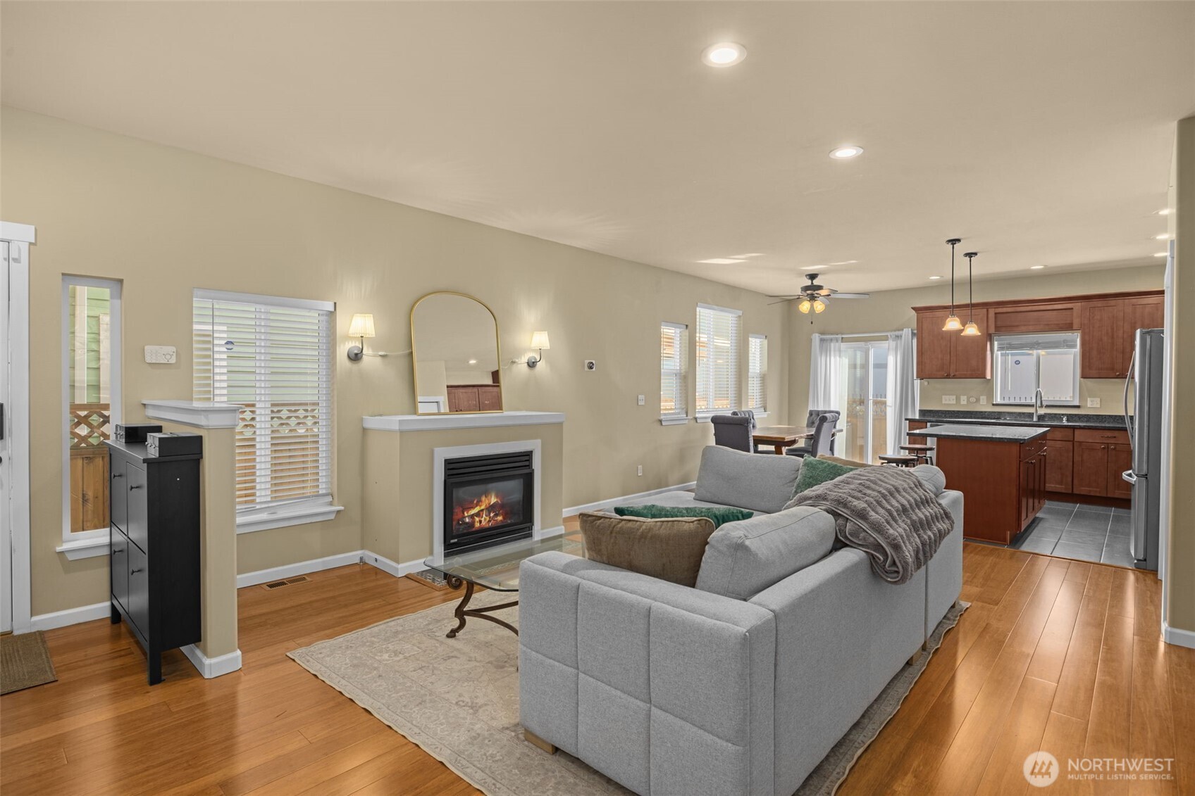 10250 17th Avenue Southwest Seattle, WA 98146 - Photo 2 of 23 a living room with furniture and a fireplace