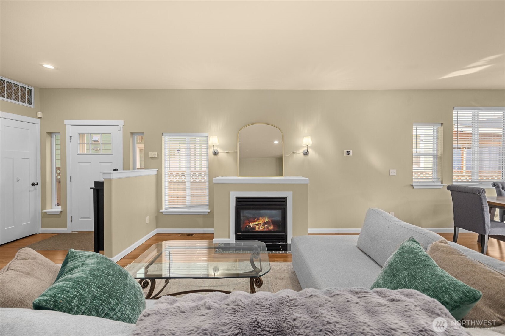 10250 17th Avenue Southwest Seattle, WA 98146 - Photo 3 of 23 a living room with furniture and a fireplace