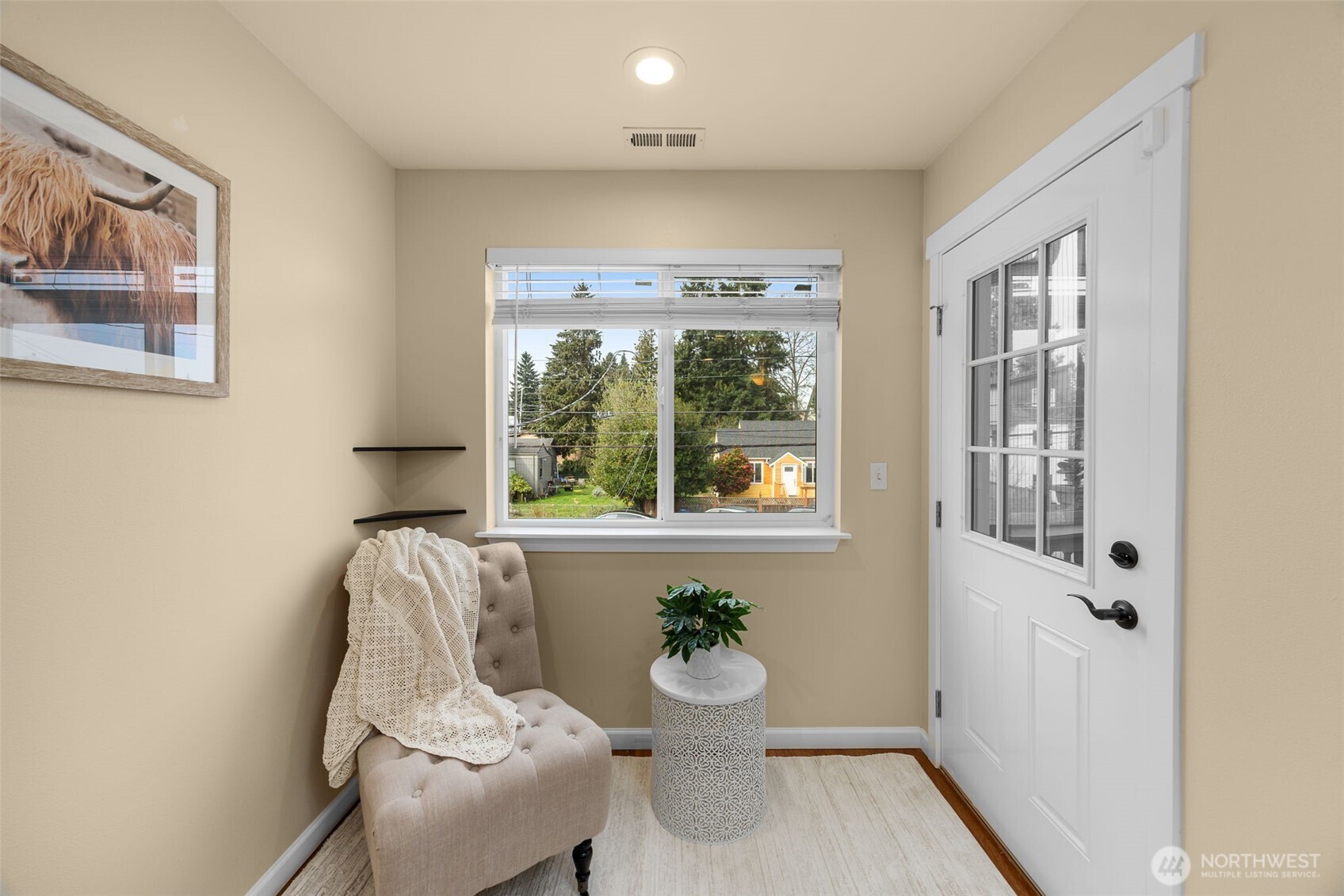 10250 17th Avenue Southwest Seattle, WA 98146 - Photo 9 of 23 a living room with furniture and a window