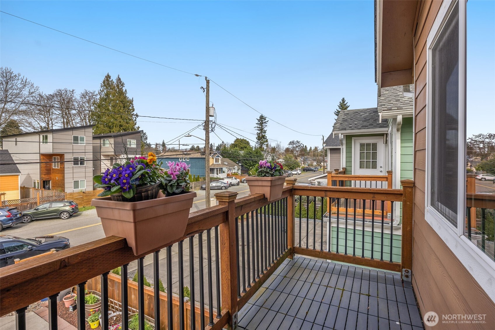 10250 17th Avenue Southwest Seattle, WA 98146 - Photo 10 of 23 a view of a house with wooden fence