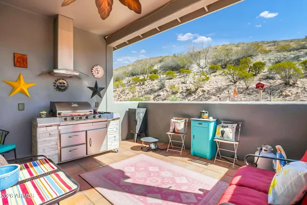 a room with furniture and a flat screen tv