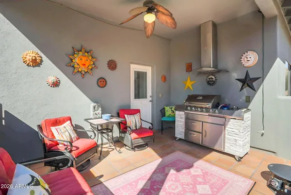a very nice looking room with a big kitchen