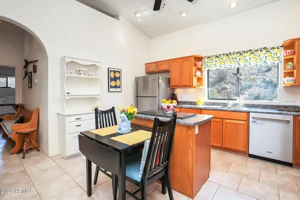 a very nice looking dining room with a large window