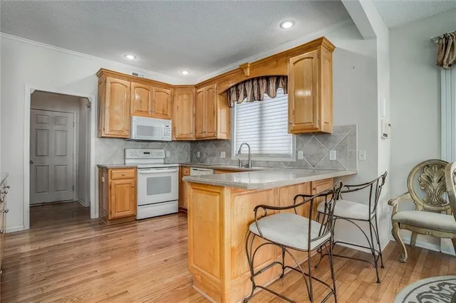 $325,000 | 5801 Northeast Hidden Meadow Drive, Lee's Summit, MO 64064