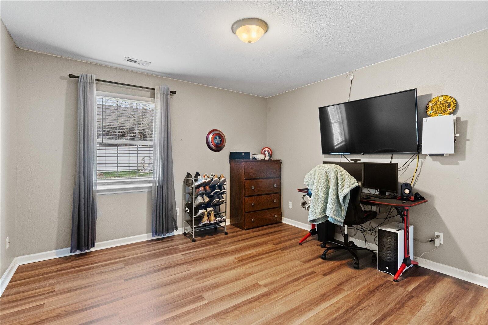 792 Colony Circle Fort Oglethorpe, GA 30742 - Photo 17 of 36 a view of a workspace with furniture and a window