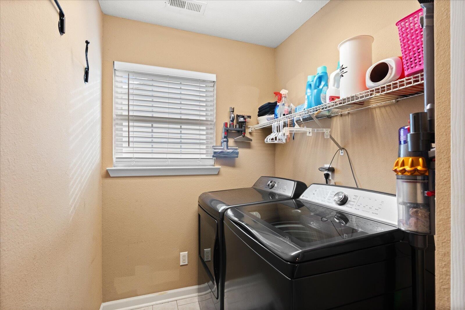 792 Colony Circle Fort Oglethorpe, GA 30742 - Photo 20 of 36 a room with a sink and cabinets