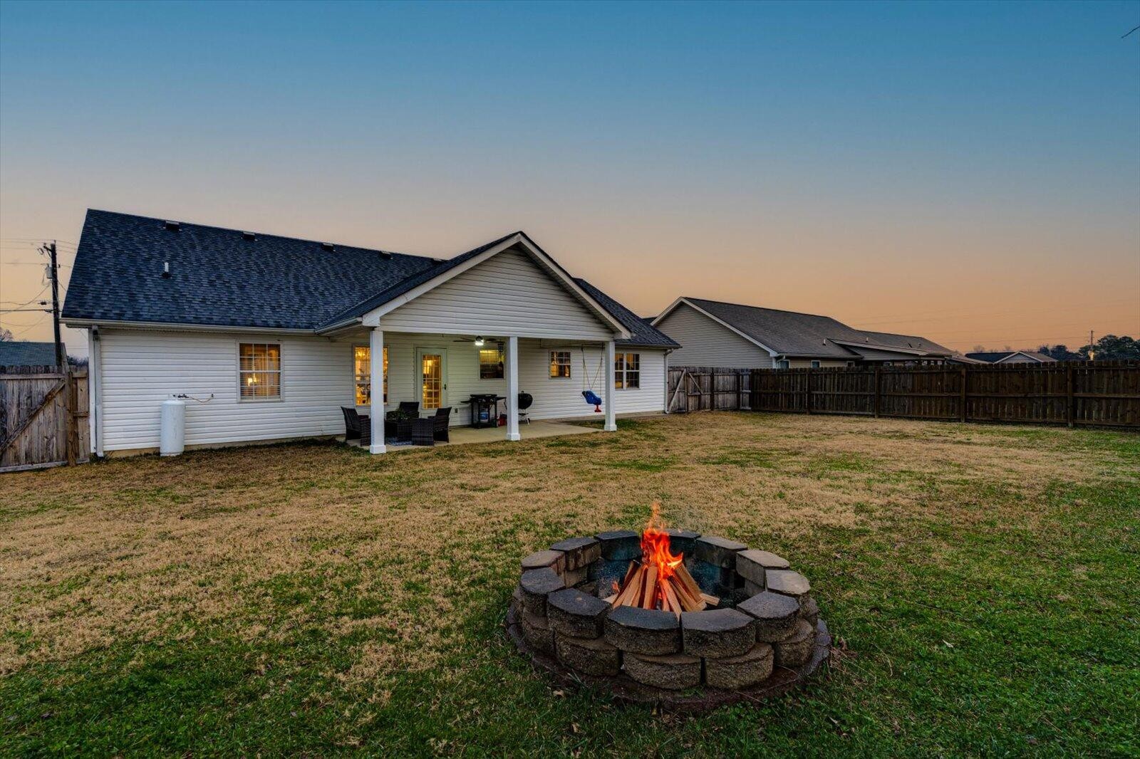 792 Colony Circle Fort Oglethorpe, GA 30742 - Photo 24 of 36 a view of a house with a yard