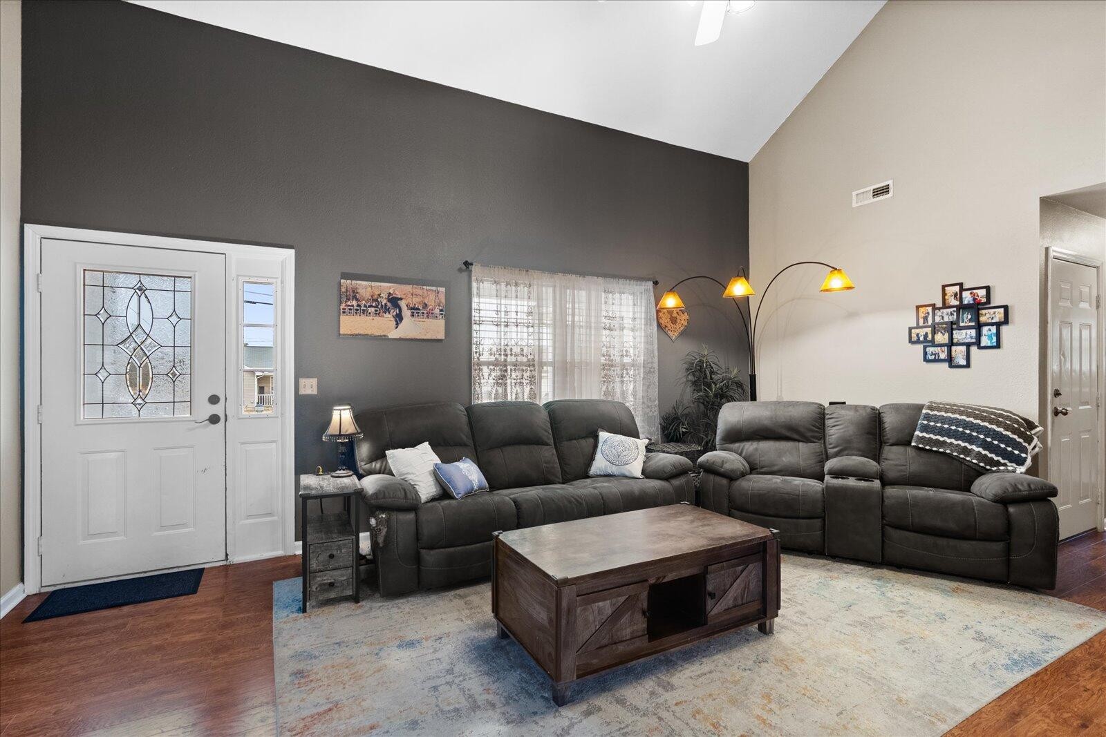 792 Colony Circle Fort Oglethorpe, GA 30742 - Photo 9 of 36 a living room with furniture and wooden floor