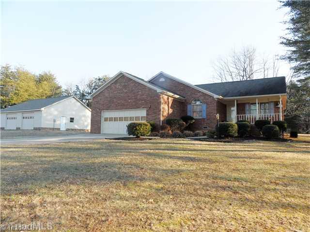 7502 Alcorn Road Greensboro, NC 27409 - Photo 2 of 16 Exterior Front. Front featuring 2 car attached garage and 2 car detached garage/workshop!