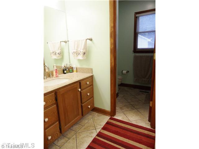 7502 Alcorn Road Greensboro, NC 27409 - Photo 12 of 16 Master Bath/Spa. The master bath has been recently renovated with new countertops and tile.