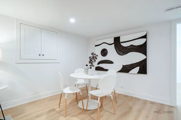 a workspace with furniture and wooden floor