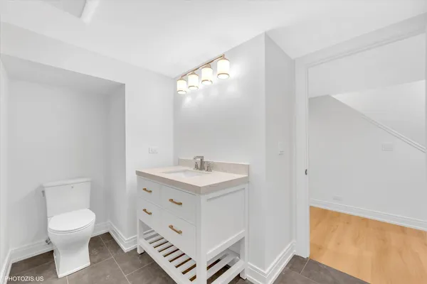 a bathroom with a sink and shower
