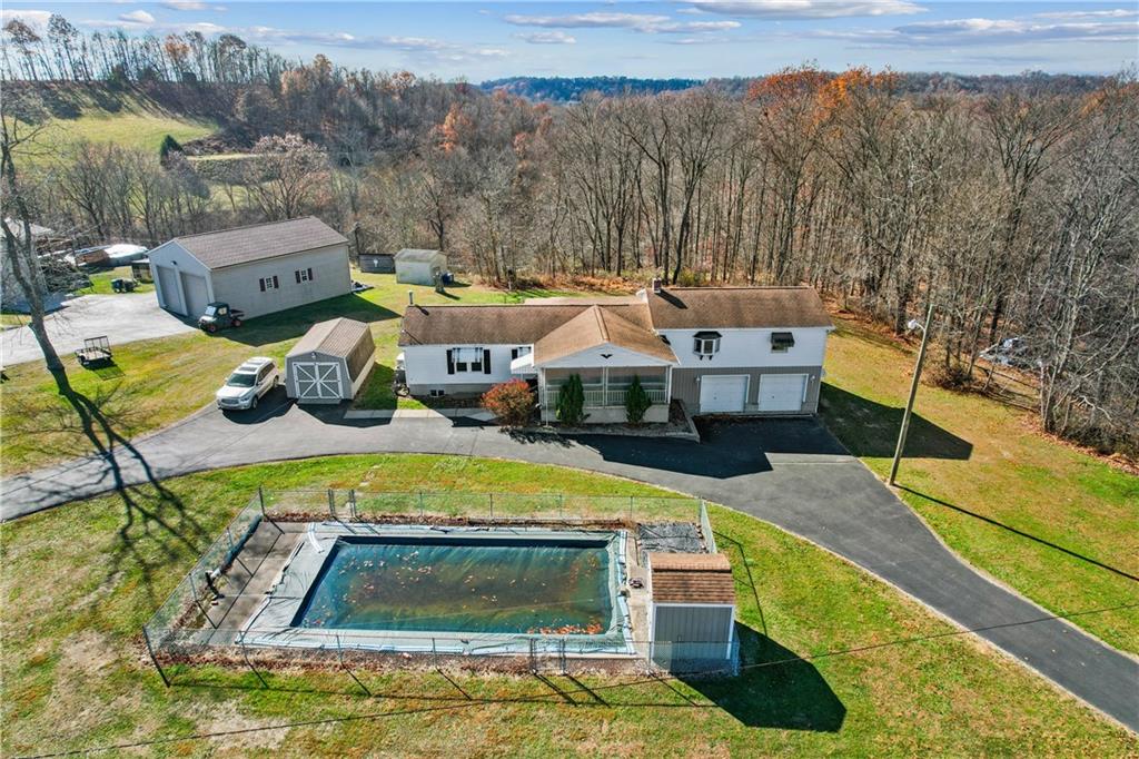 364 Spruce Hollow Road Vandergrift, PA 15690 - Photo 1 of 37 a view of a swimming pool with lounge chair
