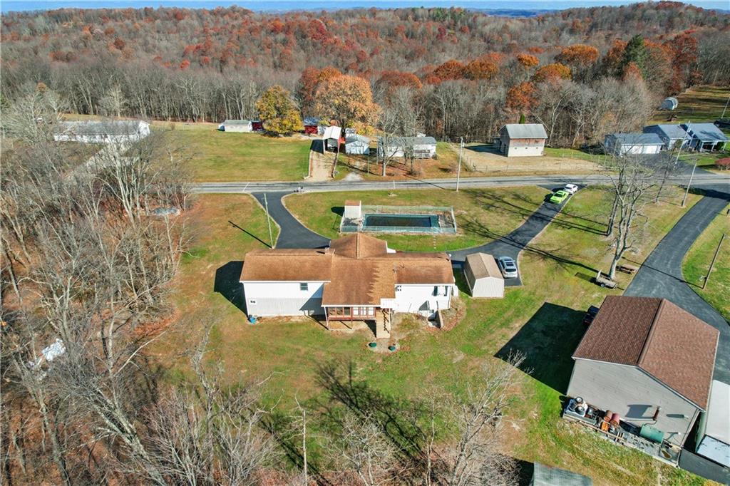 364 Spruce Hollow Road Vandergrift, PA 15690 - Photo 2 of 37 a view of a swimming pool with a patio