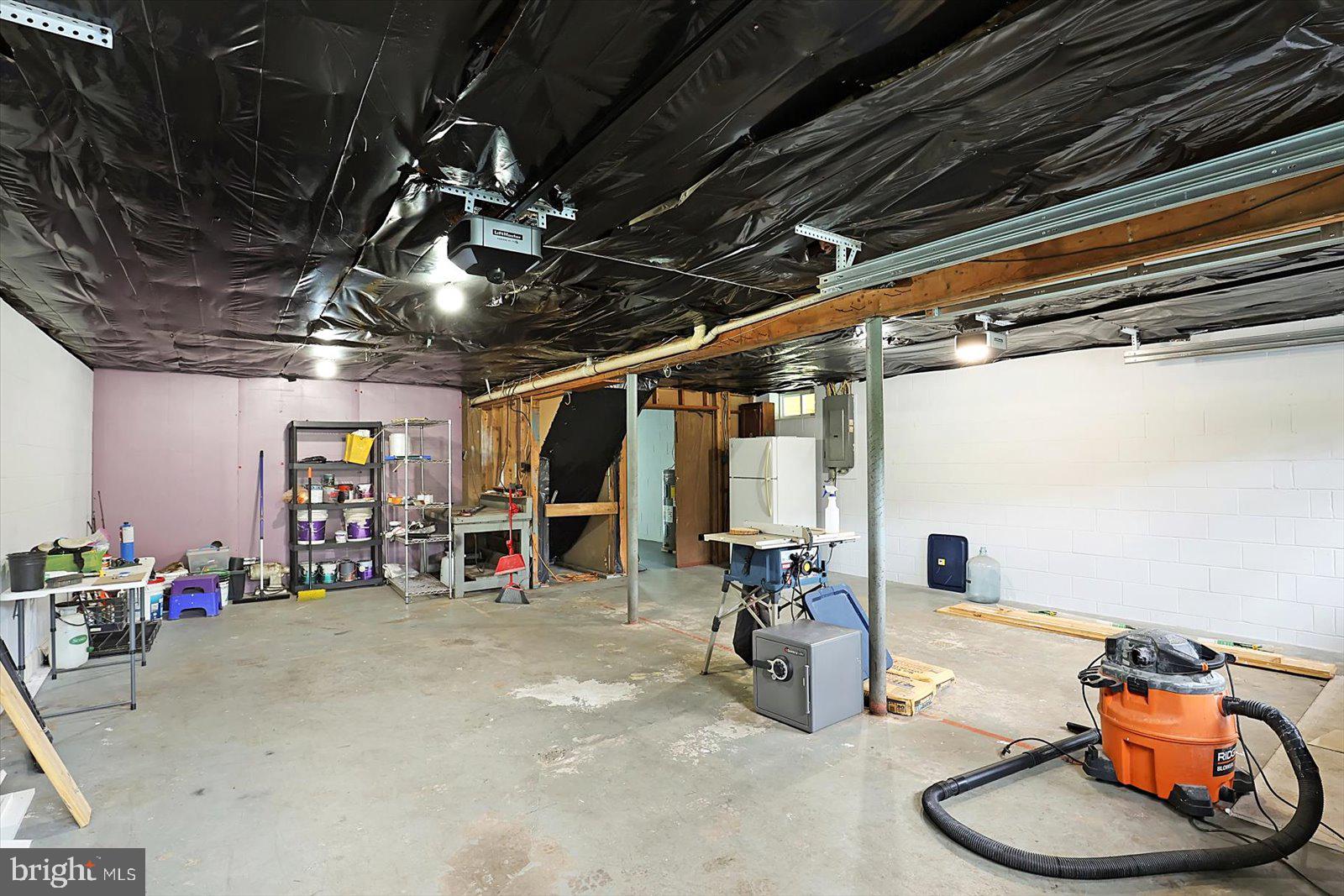 5824 Spruce Road Felton, PA 17322 - Photo 25 of 38 a view of a garage with table and chairs