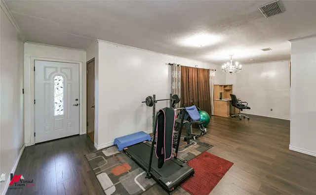 a view of a room with gym equipment