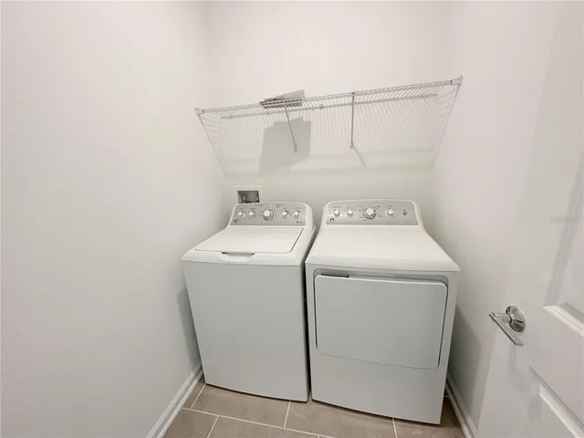 a view of a balcony with lake and mountain view