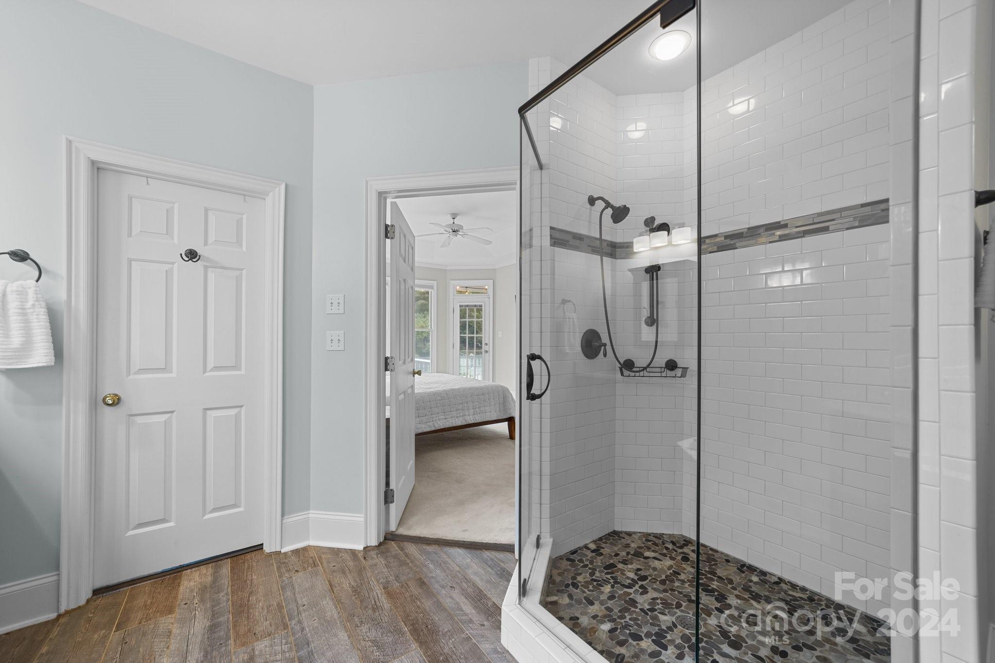 251 Kimberly Road Davidson, NC 28036 - Photo 25 of 47 a bathroom with a tub and shower