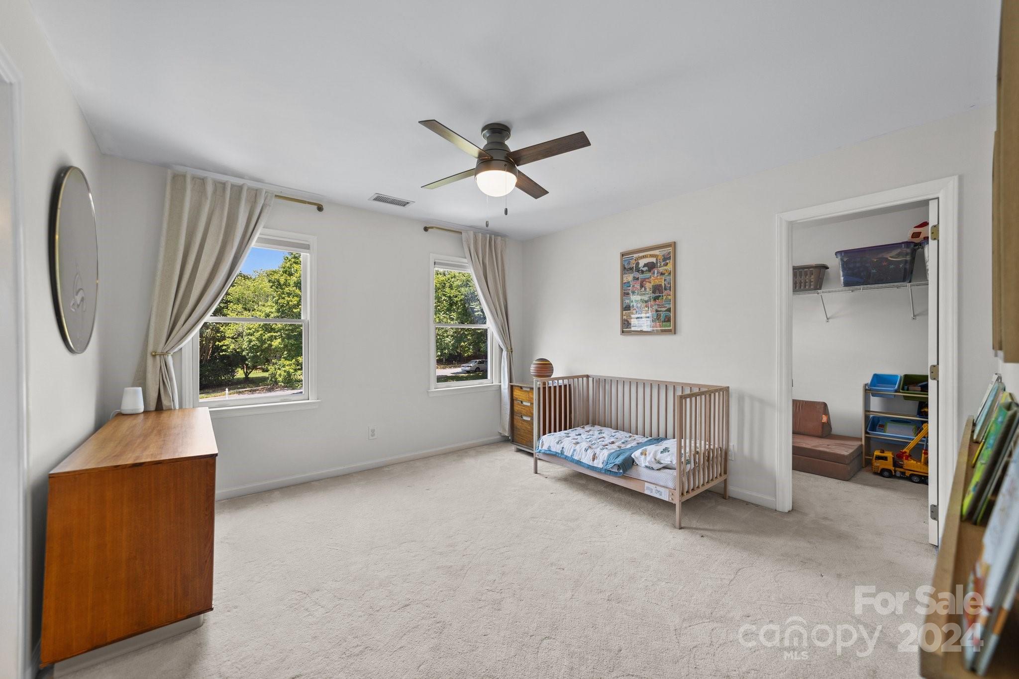 251 Kimberly Road Davidson, NC 28036 - Photo 26 of 47 a bedroom with furniture and a window