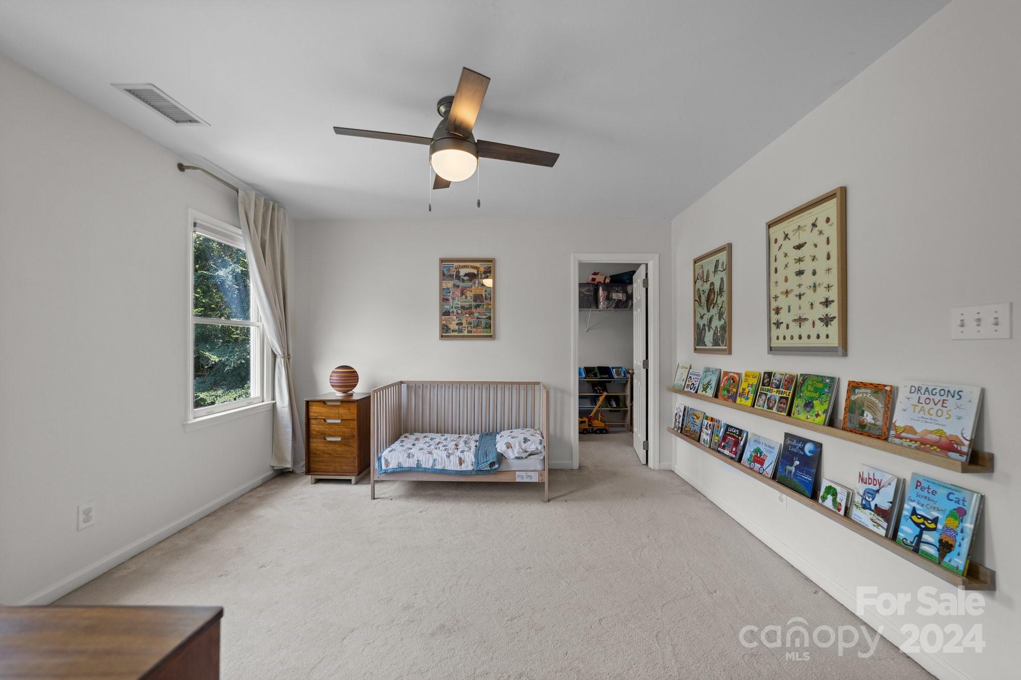 251 Kimberly Road Davidson, NC 28036 - Photo 27 of 47 a living room with furniture and a window