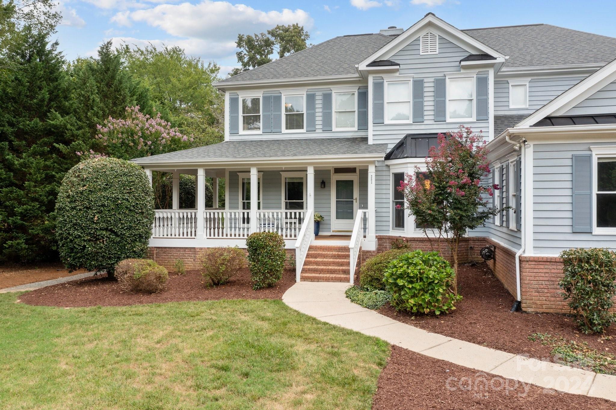 251 Kimberly Road Davidson, NC 28036 - Photo 3 of 47 front view of a house with a yard