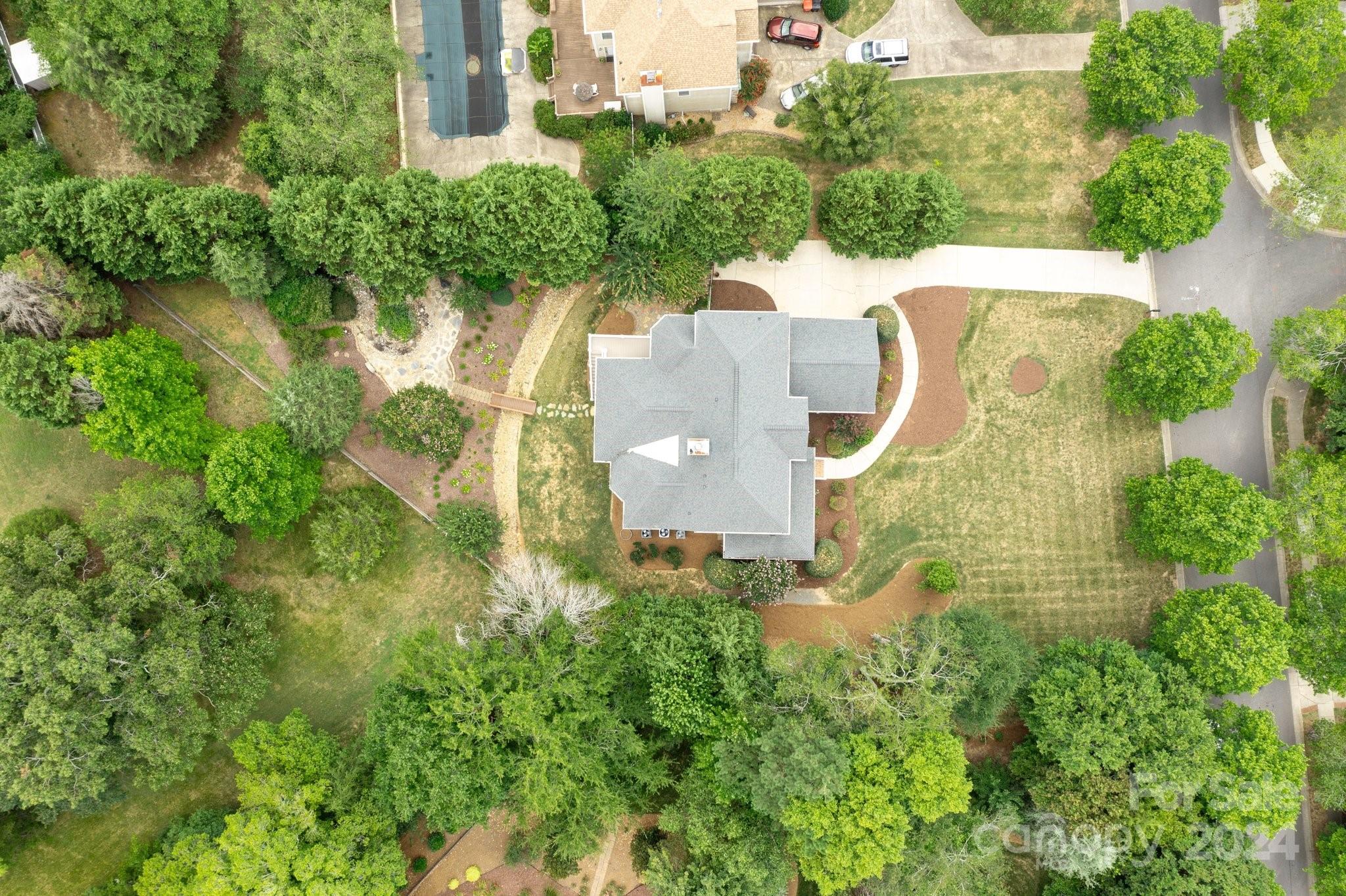 251 Kimberly Road Davidson, NC 28036 - Photo 4 of 47 an aerial view of a house with a yard basket ball court and outdoor seating