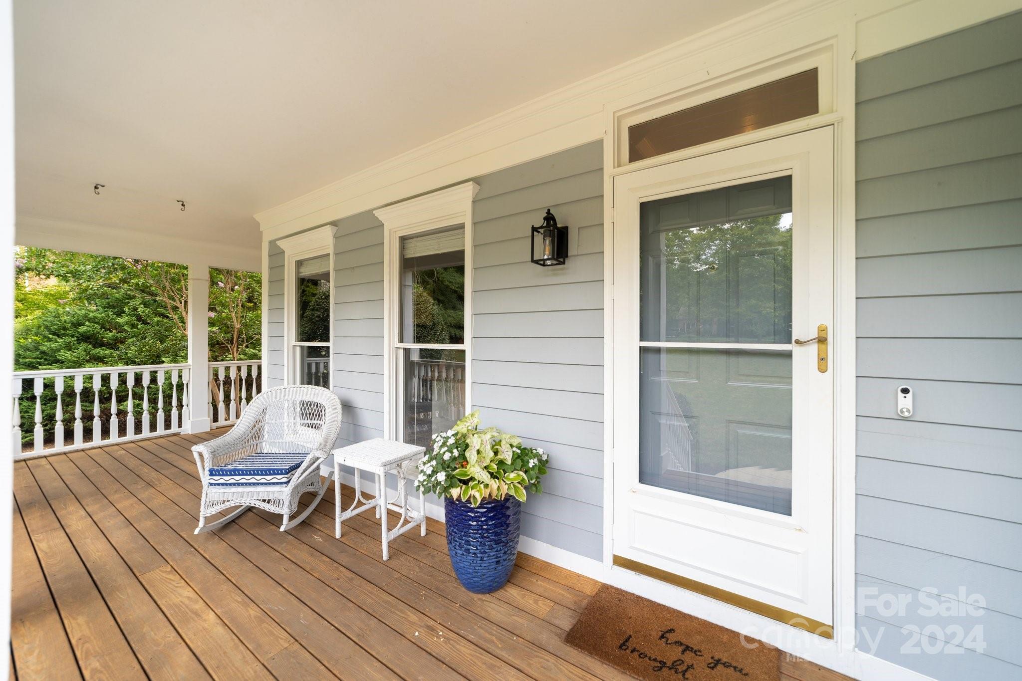 251 Kimberly Road Davidson, NC 28036 - Photo 6 of 47 a view of a house with porch and wooden floor