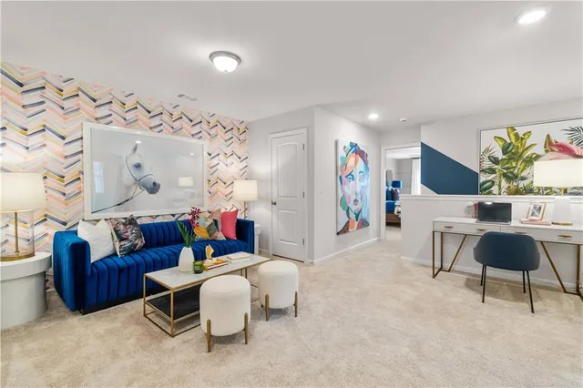 a living room with furniture and a rug