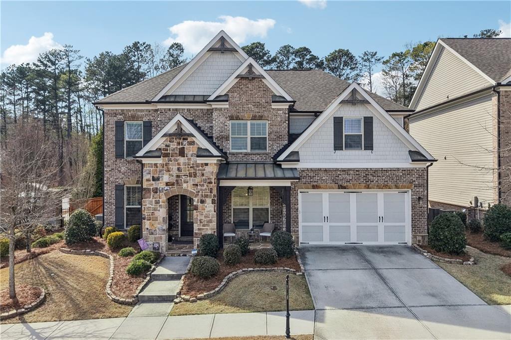 11510 Crestview Terrace Johns Creek, GA 30024 - Photo 1 of 1 a front view of a house with yard