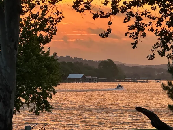 a view of lake with mountain