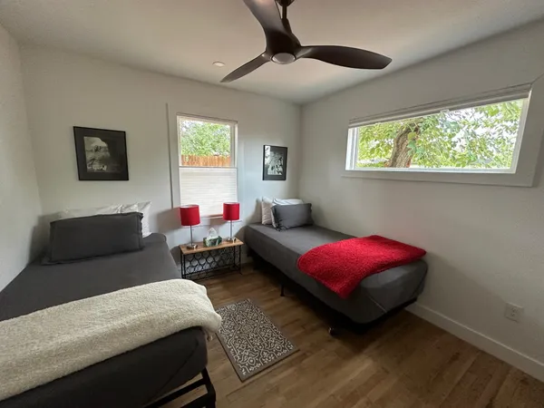 a living room with furniture and a window