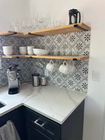 a kitchen with a sink and a stove