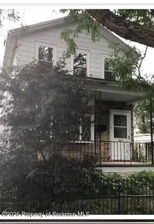 a house view with a outdoor space