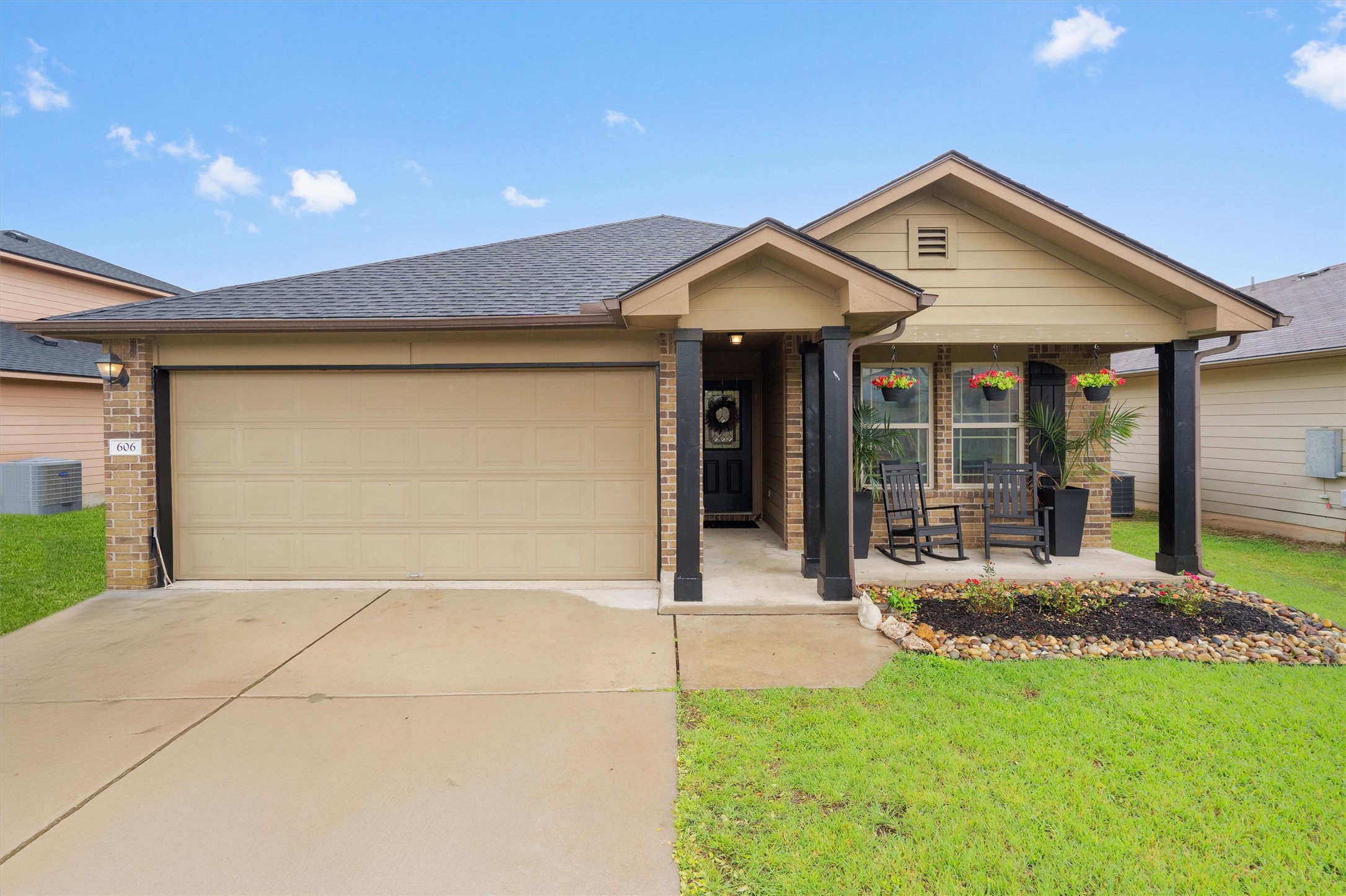 606 Old Peak Road Georgetown, TX 78626 - Photo 22 of 23 a front view of a house with a yard