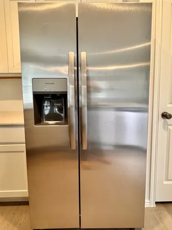 a view of a livingroom with a fireplace
