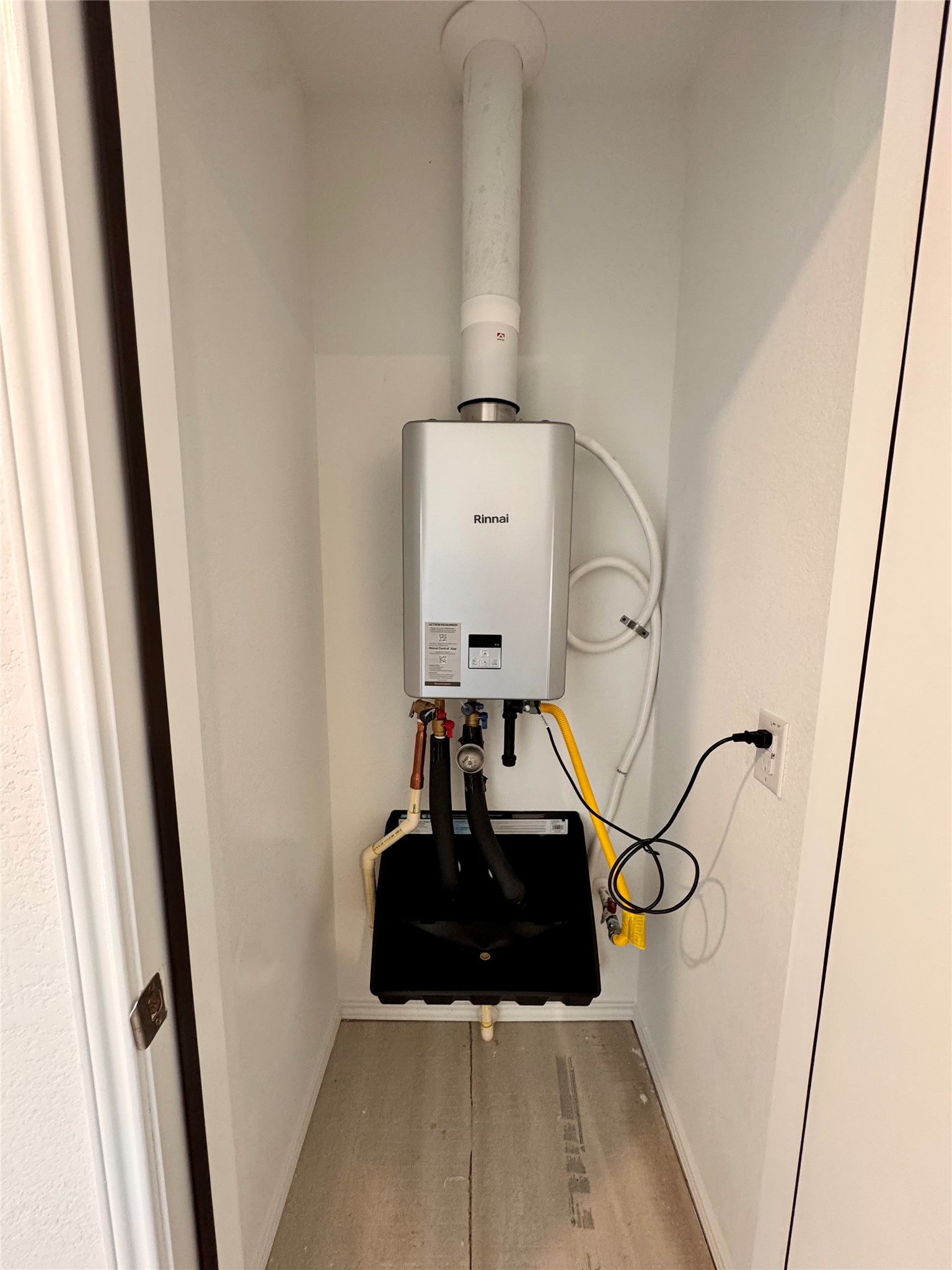 554 Sormonne Loop Kyle, TX 78640 - Photo 31 of 35 Tankless water heater so there's plenty of hot water for everyone!