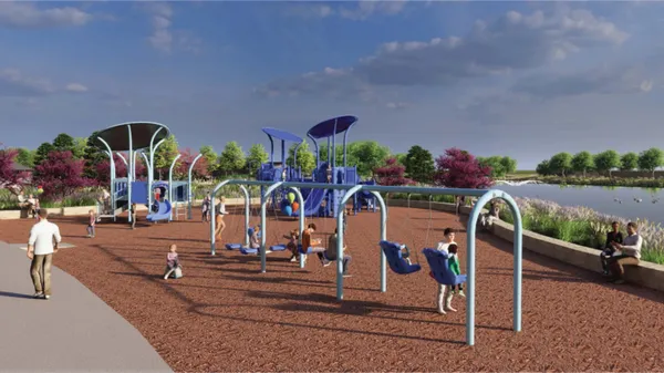 a view of a lake with houses in the back