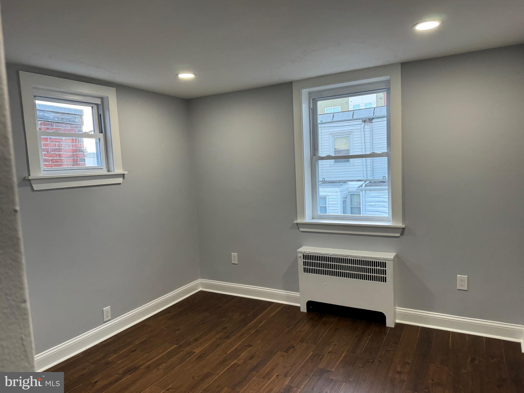126 Richfield Road Upper Darby, PA 19082 - Photo 12 of 21 a view of room with wooden floor and fan