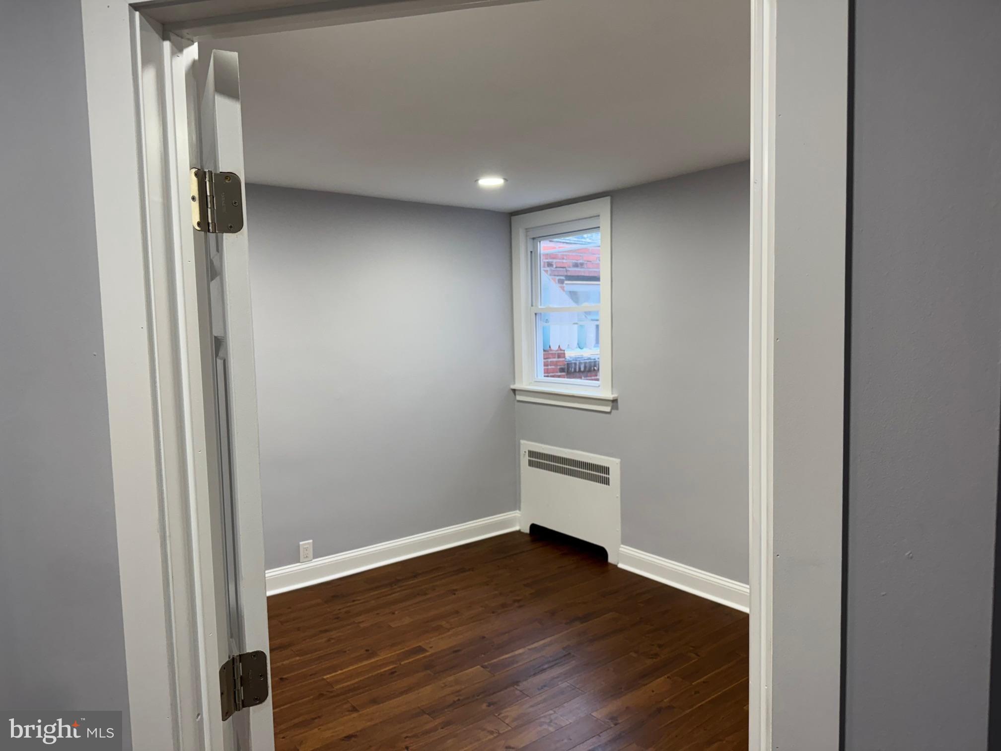 126 Richfield Road Upper Darby, PA 19082 - Photo 13 of 21 a view of livingroom with hardwood floor and hallway