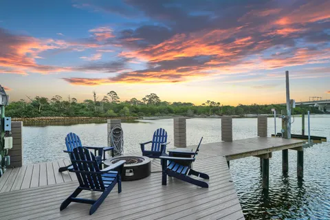 a bathroom with a sink and a shower curtain