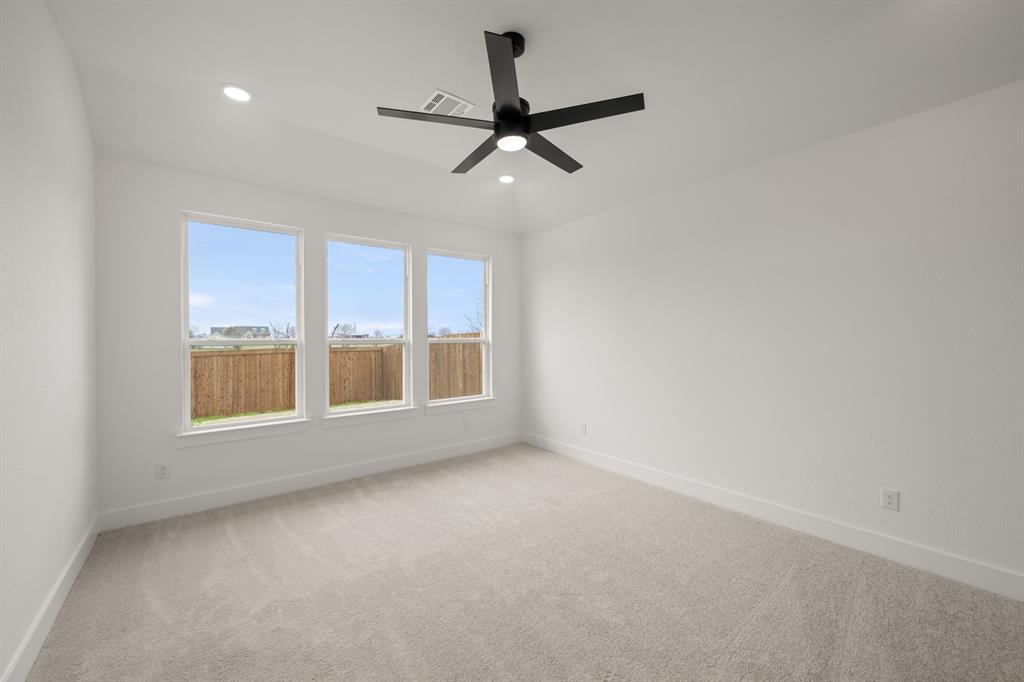 1725 Nesting Robin Lane Krum, TX 76249 - Photo 16 of 27 an empty room with a window