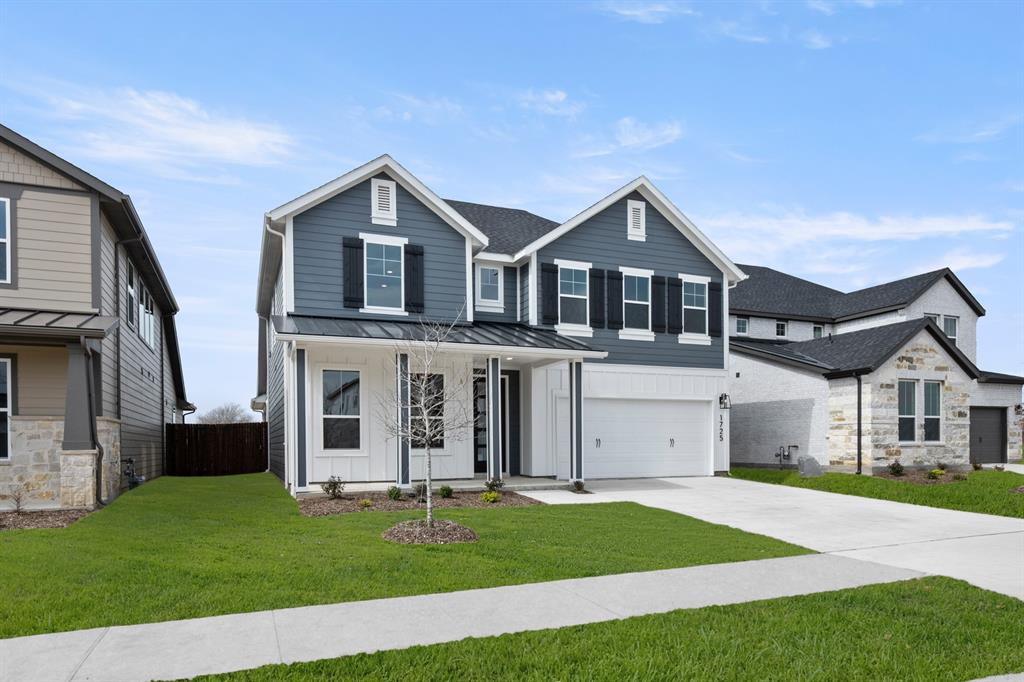 1725 Nesting Robin Lane Krum, TX 76249 - Photo 2 of 27 a front view of a house with a yard