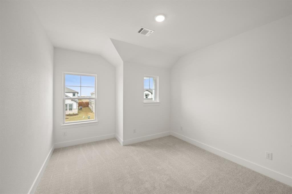 1725 Nesting Robin Lane Krum, TX 76249 - Photo 24 of 27 an empty room with windows