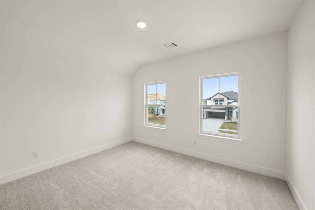 1725 Nesting Robin Lane Krum, TX 76249 - Photo 25 of 27 an empty room with windows