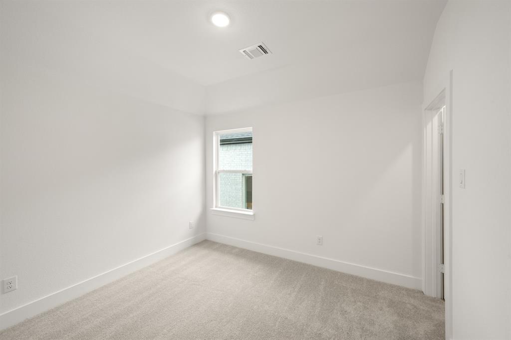1725 Nesting Robin Lane Krum, TX 76249 - Photo 26 of 27 a view of an empty room with a window