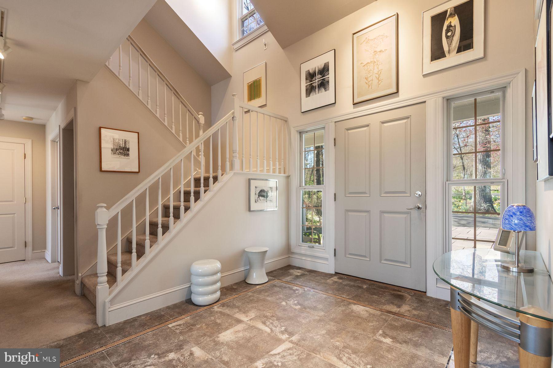 20 Solebury Mountain Road New Hope, PA 18938 - Photo 7 of 43 a view of an entryway with wooden floor and windows