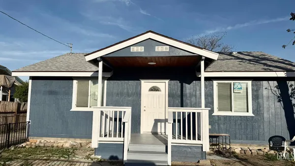 a front view of a house with a porch