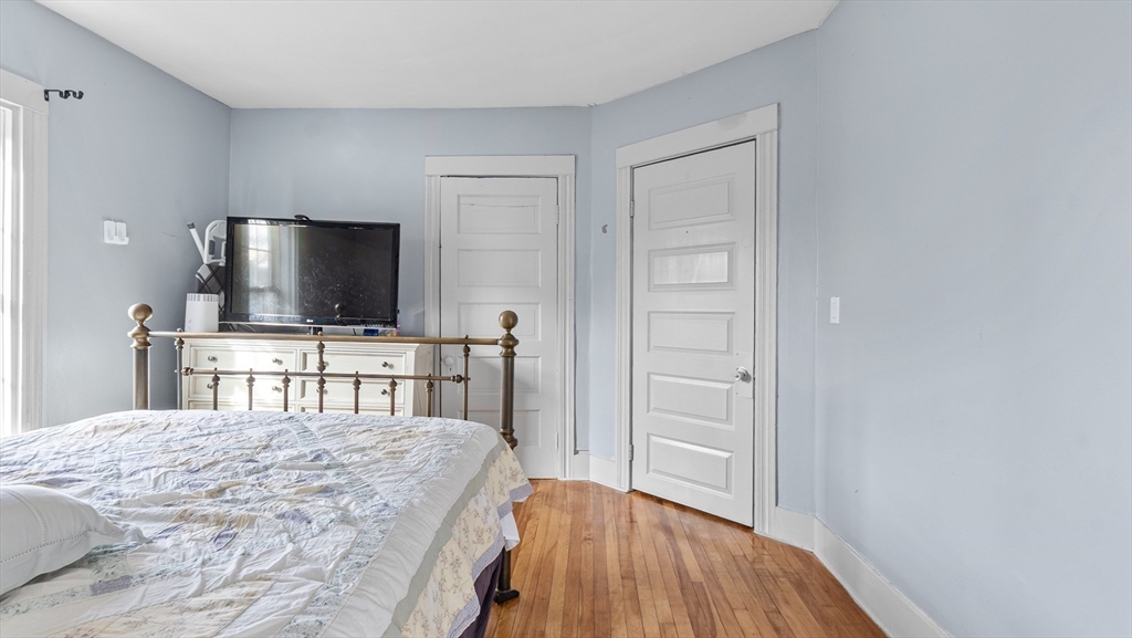 6 Crescent Street, Unit 6 Northbridge, MA 01588 - Photo 11 of 24 a living room with furniture and a flat screen tv