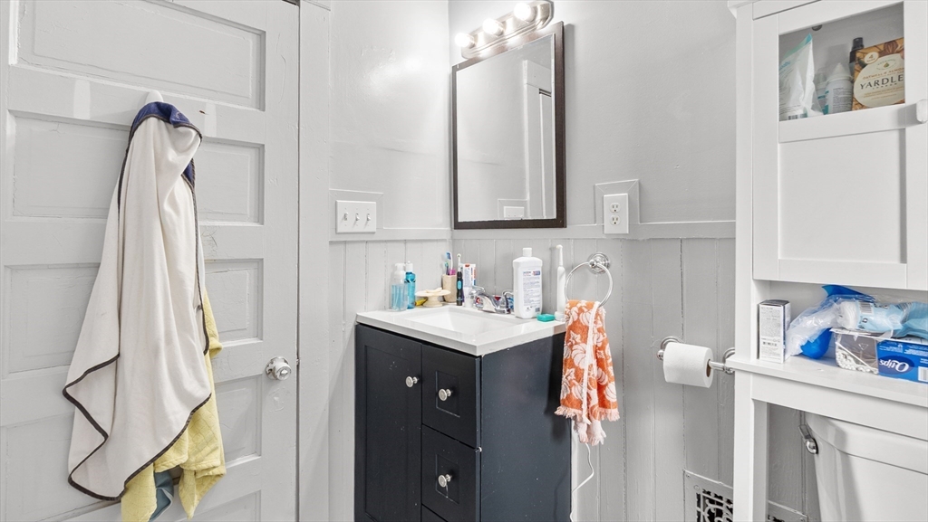 6 Crescent Street, Unit 6 Northbridge, MA 01588 - Photo 13 of 24 a utility room with cabinets