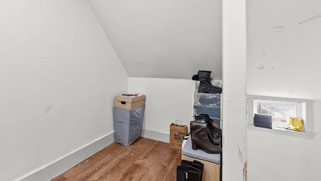6 Crescent Street, Unit 6 Northbridge, MA 01588 - Photo 15 of 24 a view of a bedroom with bed and closet